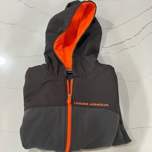Like new!!! Under Armour Storm jacket. Youth Large.